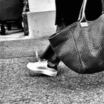 The Shoulder Bag ORIGINAL XL (Weekender) by LABEL17 is made from supple, vegetable-tanned nappa leather. The hand-braided leather bag can be made smaller on both sides from the inside with press studs and also includes a detachable, hand-braided pouch for organization inside the bag.