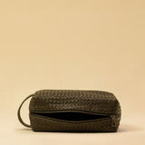 The elegant Braided Travel Pouch VOYAGER by LABEL17  is handcrafted from fine, braided nappa leather and stands out with its soft feel and refined craftsmanship. A zipper keeps everything securely closed, while the interior is lined with water-resistant fabric and features practical side compartments – for stylish organization on the go. Handmade in Morocco.