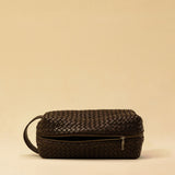 The elegant Braided Travel Pouch VOYAGER by LABEL17  is handcrafted from fine, braided nappa leather and stands out with its soft feel and refined craftsmanship. A zipper keeps everything securely closed, while the interior is lined with water-resistant fabric and features practical side compartments – for stylish organization on the go. Handmade in Morocco.