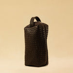 The elegant Braided Travel Pouch VOYAGER by LABEL17  is handcrafted from fine, braided nappa leather and stands out with its soft feel and refined craftsmanship. A zipper keeps everything securely closed, while the interior is lined with water-resistant fabric and features practical side compartments – for stylish organization on the go. Handmade in Morocco.