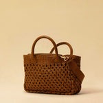 The Handbag Cabas Lalla Mini by LABEL17 is the smallest version of the popular Cabas line – a lightweight handbag made from supple, vegetable-tanned nappa leather. Crafted with a unique braiding technique it comes with a zip closure and an adjustable, detachable shoulder strap. The leather-lined interior features a secure inner pocket. Wear it crossbody or carry it by hand – perfect for your essentials on the go. Handmade in Morocco.