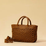 The Handbag Cabas Lalla Mini by LABEL17 is the smallest version of the popular Cabas line – a lightweight handbag made from supple, vegetable-tanned nappa leather. Crafted with a unique braiding technique it comes with a zip closure and an adjustable, detachable shoulder strap. The leather-lined interior features a secure inner pocket. Wear it crossbody or carry it by hand – perfect for your essentials on the go. Handmade in Morocco.