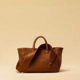 The Cabas Medium by LABEL17 is a lightweight handbag crafted from supple, vegetable-tanned nappa leather. Hand-braided and finished with a zip closure and detachable shoulder strap, it features a leather-lined interior with a secure inner pocket – combining refined design with everyday functionality. Handmade in Morocco.