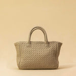 The Handbag Cabas Mini by LABEL17 is the smallest version of the popular Cabas line – a lightweight handbag made from supple, vegetable-tanned nappa leather. Hand-braided, with a zip closure and an adjustable, detachable shoulder strap. The leather-lined interior features a secure inner pocket. Wear it crossbody or carry it by hand – perfect for your essentials on the go. Handmade in Morocco.