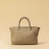 The Handbag Cabas Mini by LABEL17 is the smallest version of the popular Cabas line – a lightweight handbag made from supple, vegetable-tanned nappa leather. Hand-braided, with a zip closure and an adjustable, detachable shoulder strap. The leather-lined interior features a secure inner pocket. Wear it crossbody or carry it by hand – perfect for your essentials on the go. Handmade in Morocco.