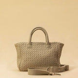 The Handbag Cabas Mini by LABEL17 is the smallest version of the popular Cabas line – a lightweight handbag made from supple, vegetable-tanned nappa leather. Hand-braided, with a zip closure and an adjustable, detachable shoulder strap. The leather-lined interior features a secure inner pocket. Wear it crossbody or carry it by hand – perfect for your essentials on the go. Handmade in Morocco.