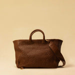 The Cabas Standard by LABEL17 is a larger version of the Cabas Medium – a lightweight handbag made from supple, vegetable-tanned nappa leather. Hand-braided, it features a zip closure, detachable shoulder strap, and a leather-lined interior with a secure inner pocket.
Spacious enough to fit your 14“ laptop in our Laptop Case 14 – perfect for a stylish everyday routine. Handmade in Morocco