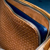 Style and Security, woven into one. The Braided Laptop Case 14 by LABEL17, combines hand-braided lamb nappa leather on the front with smooth leather on the back. Lightly padded, it holds laptops from 13” to 14” securely – with room for documents.
Also available for 15” and 16” devices.
Handmade in Morocco.