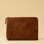 Style and Security, woven into one. The Braided Laptop Case 14 by LABEL17, combines hand-braided lamb nappa leather on the front with smooth leather on the back. Lightly padded, it holds laptops from 13” to 14” securely – with room for documents.
Also available for 15” and 16” devices.
Handmade in Morocco.