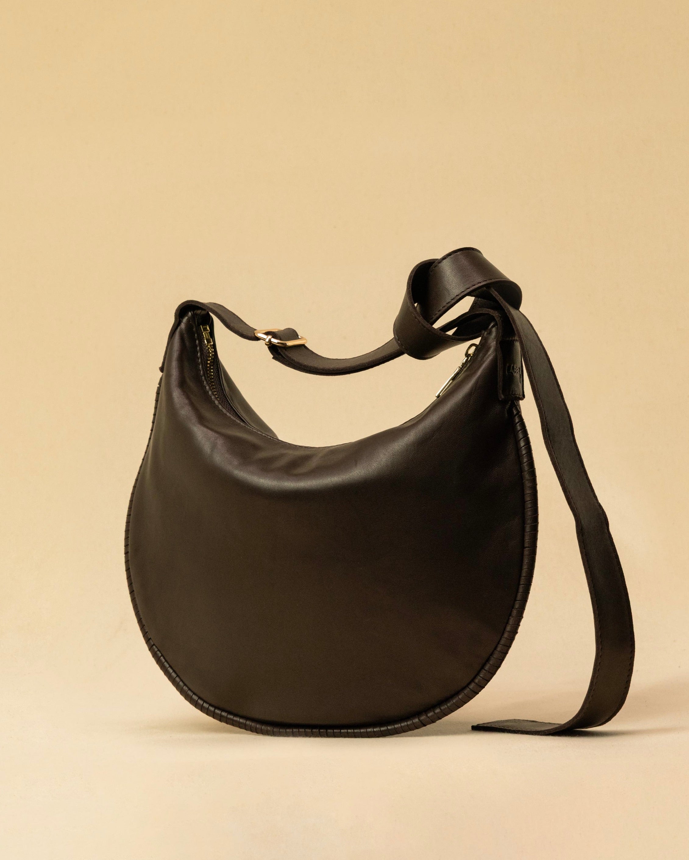 LABEL17's Shoulder Bag Saddle IVY Medium in Darkbrown, made of finest Lamb-Nappa, hand-crafted in Morocco