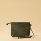 The Braided Pouch GAIA by LABEL17 is hand-braided from soft, vegetable-tanned nappa leather using an intricate braiding technique. Designed to carry your essentials, it features a leather strap with a carabiner, allowing you to wear it on its own or attach it seamlessly inside your LABEL17 bag.