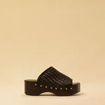 Open Toe Clogs ELLA in dark brown by LABEL17, crafted from supple, vegetable-tanned lamb nappa leather. The shoe features a durable Vibram sole for comfort and stability. The artisanal craftsmanship enhances the overall aesthetic, making these clogs a true statement piece. Quiet luxury at its best. Handmade in Greece.