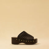 Open Toe Clogs ELLA in dark brown by LABEL17, crafted from supple, vegetable-tanned lamb nappa leather. The shoe features a durable Vibram sole for comfort and stability. The artisanal craftsmanship enhances the overall aesthetic, making these clogs a true statement piece. Quiet luxury at its best. Handmade in Greece.