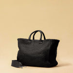 The Cabas Standard by LABEL17 is a larger version of the Cabas Medium – a lightweight handbag made from supple, vegetable-tanned nappa leather. Hand-braided, it features a zip closure, detachable shoulder strap, and a leather-lined interior with a secure inner pocket.
Spacious enough to fit your 14“ laptop in our Laptop Case 14 – perfect for a stylish everyday routine. Handmade in Morocco