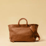 The Cabas Standard by LABEL17 is a larger version of the Cabas Medium – a lightweight handbag made from supple, vegetable-tanned nappa leather. Hand-braided, it features a zip closure, detachable shoulder strap, and a leather-lined interior with a secure inner pocket.
Spacious enough to fit your 14“ laptop in our Laptop Case 14 – perfect for a stylish everyday routine. Handmade in Morocco