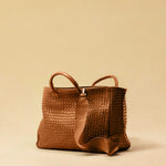 The Cabas Standard by LABEL17 is a larger version of the Cabas Medium – a lightweight handbag made from supple, vegetable-tanned nappa leather. Hand-braided, it features a zip closure, detachable shoulder strap, and a leather-lined interior with a secure inner pocket.
Spacious enough to fit your 14“ laptop in our Laptop Case 14 – perfect for a stylish everyday routine. Handmade in Morocco