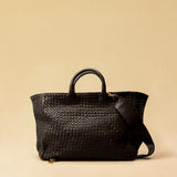 The Cabas Standard by LABEL17 is a larger version of the Cabas Medium – a lightweight handbag made from supple, vegetable-tanned nappa leather. Hand-braided, it features a zip closure, detachable shoulder strap, and a leather-lined interior with a secure inner pocket.
Spacious enough to fit your 14“ laptop in our Laptop Case 14 – perfect for a stylish everyday routine. Handmade in Morocco