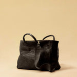 The Cabas Standard by LABEL17 is a larger version of the Cabas Medium – a lightweight handbag made from supple, vegetable-tanned nappa leather. Hand-braided, it features a zip closure, detachable shoulder strap, and a leather-lined interior with a secure inner pocket.
Spacious enough to fit your 14“ laptop in our Laptop Case 14 – perfect for a stylish everyday routine. Handmade in Morocco