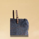 LABEL17 presents a detail of the Shoulder Bag Large in Harris Tweed, Blue, stitched with #LOVE