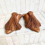 The Mule CHOUCHA by LABEL17 is crafted from supple, vegetable-tanned lamb nappa leather. A large, soft pompom sways elegantly with every step, adding a playful yet refined touch to the design. Handmade in Morocco.