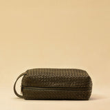 The elegant Braided Travel Pouch VOYAGER by LABEL17  is handcrafted from fine, braided nappa leather and stands out with its soft feel and refined craftsmanship. A zipper keeps everything securely closed, while the interior is lined with water-resistant fabric and features practical side compartments – for stylish organization on the go. Handmade in Morocco.