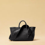 The Cabas Medium by LABEL17 is a lightweight handbag crafted from supple, vegetable-tanned nappa leather. Hand-braided and finished with a zip closure and detachable shoulder strap, it features a leather-lined interior with a secure inner pocket – combining refined design with everyday functionality. Handmade in Morocco.