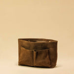 The Bag Organizer PENNY by LABEL17 is crafted from supple suede leather and brings effortless style and order to large handbags. With integrated outer and inner compartments and a magnetic closure, it fits perfectly into our Shoulder Bag ORIGINAL.