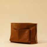 The Bag Organizer PENNY by LABEL17 is crafted from supple nappa leather and brings effortless style and order to large handbags. With integrated outer and inner compartments and a magnetic closure, it fits perfectly into our Shoulder Bag ORIGINAL.