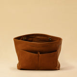 The Bag Organizer PENNY by LABEL17 is crafted from supple nappa leather and brings effortless style and order to large handbags. With integrated outer and inner compartments and a magnetic closure, it fits perfectly into our Shoulder Bag ORIGINAL.