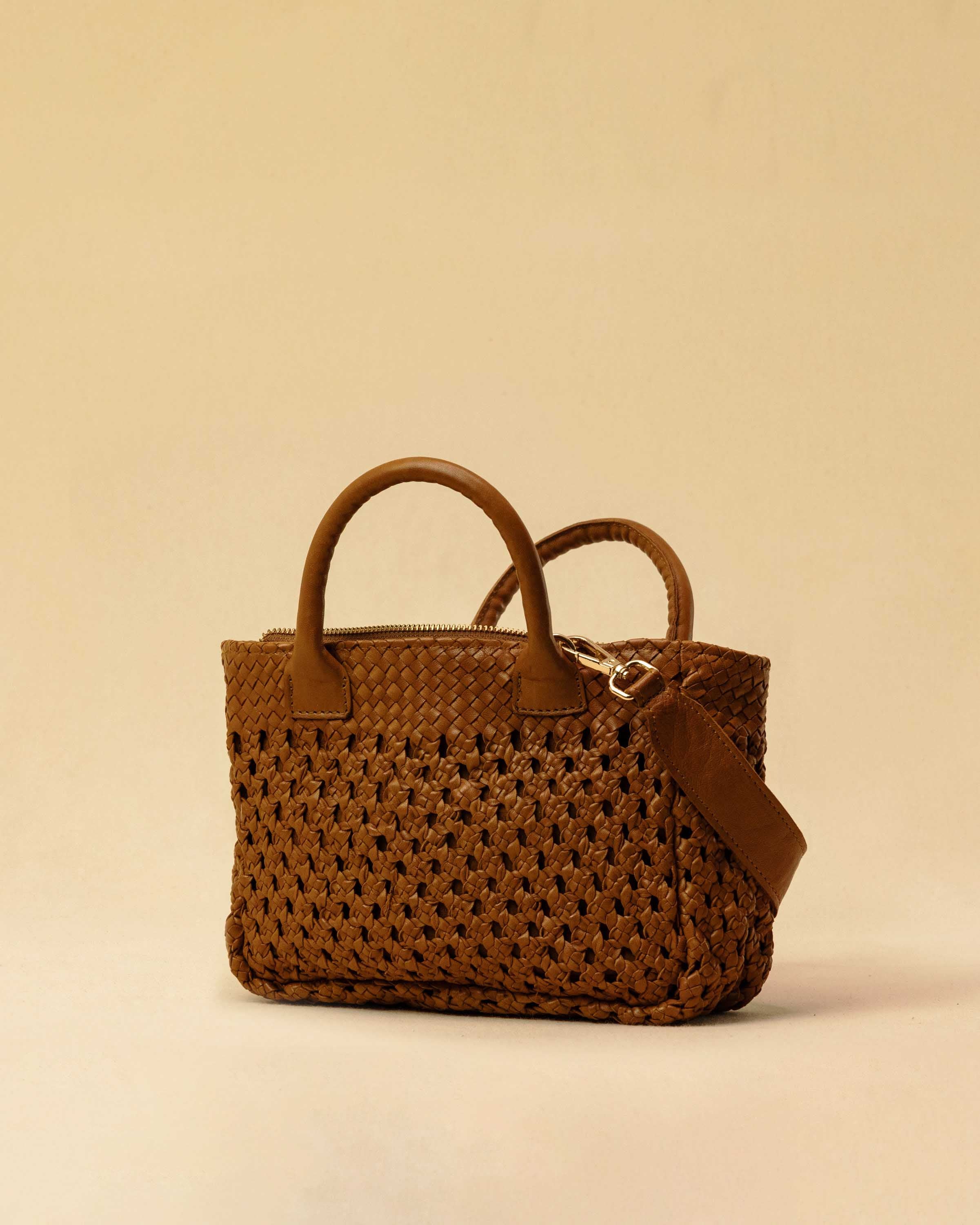 The Handbag Cabas Lalla Mini by LABEL17 is the smallest version of the popular Cabas line – a lightweight handbag made from supple, vegetable-tanned nappa leather. Crafted with a unique braiding technique it comes with a zip closure and an adjustable, detachable shoulder strap. The leather-lined interior features a secure inner pocket. Wear it crossbody or carry it by hand – perfect for your essentials on the go. Handmade in Morocco.