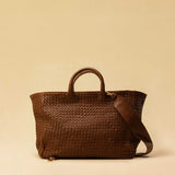 The Cabas Standard by LABEL17 is a larger version of the Cabas Medium – a lightweight handbag made from supple, vegetable-tanned nappa leather. Hand-braided, it features a zip closure, detachable shoulder strap, and a leather-lined interior with a secure inner pocket.
Spacious enough to fit your 14“ laptop in our Laptop Case 14 – perfect for a stylish everyday routine. Handmade in Morocco