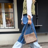The Shoulder Bag ALIA by LABEL17 is intricately hand-braided using a combination of braiding techniques – a true masterpiece of craftsmanship. It features a zip closure, a leather-lined interior, and a secure inner pocket. With an adjustable strap, it can be worn over the shoulder or crossbody – perfect from day to evening. Handmade in Morocco.