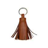 Keyring Pompom Medium in Cognac von LABEL17: Mittelgrosser Schlüsselanhänger, gefertigt aus geschmeidigem, pflanzlich gegerbtem Lamm-Nappaleder. Liegt angenehm in der Hand und ziert jeden Schlüsselbund. Grösse: L 8.5 cm, Ø 2.5 cm, handgefertigt in Marokko.