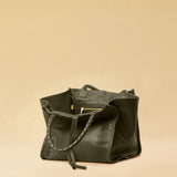 The Shoulder Bag IVY, crafted from supple, vegetable-tanned nappa leather, stands out for its artisanal detailing, distinctive side seams, and long braided handles. The interior lining and zippered side pocket are also made of fine nappa leather.