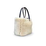 LABEL17 presents the reversible Shearling Bag called Shoulder Bag Shearling Reversible Snow in Bronze, Made in Switzerland