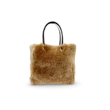 LABEL17 presents the reversible Shearling Bag called Shoulder Bag Shearling Reversible Snow in Caramel, Made in Switzerland