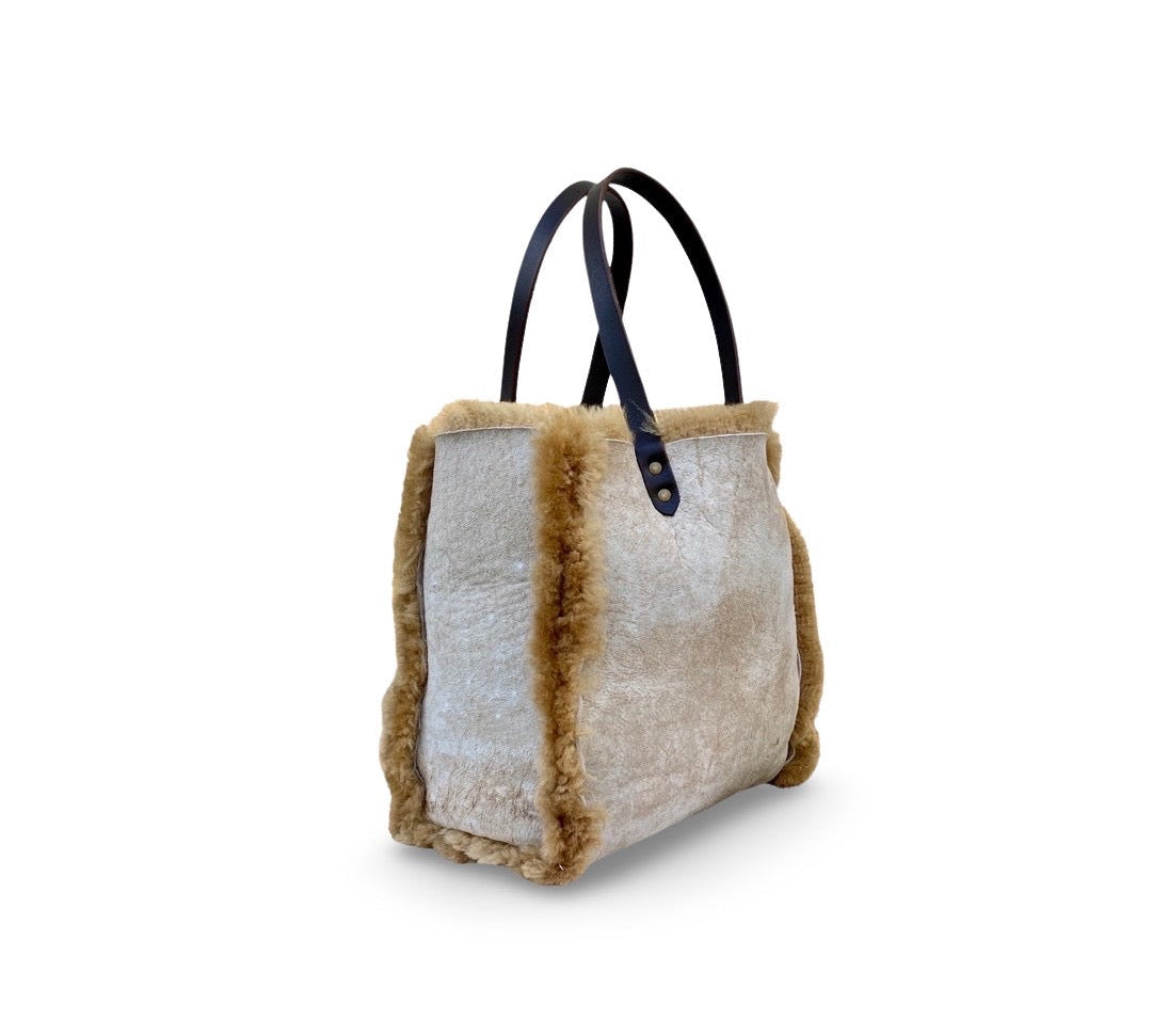 LABEL17 presents the reversible Shearling Bag called Shoulder Bag Shearling Reversible Snow in Caramel, Made in Switzerland