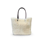 LABEL17 presents the reversible Shearling Bag called Shoulder Bag Shearling Reversible Snow in Nature, Made in Switzerland