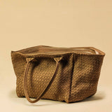 The Shoulder Bag ORIGINAL by LABEL17 is a timeless piece, crafted from fine, vegetable-tanned suede leather and hand-braided. It features a zipper closure and a convenient interior pocket for your essentials.