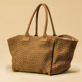 The Shoulder Bag ORIGINAL by LABEL17 is a timeless piece, crafted from fine, vegetable-tanned suede leather and hand-braided. It features a zipper closure and a convenient interior pocket for your essentials.