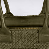 The Shoulder Bag ORIGINAL by LABEL17 is a timeless piece, crafted from fine, vegetable-tanned nappa leather and hand-braided. It features a zipper closure and a convenient interior pocket for your essentials.