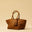 The Shoulder Bag ORIGINAL by LABEL17 is a timeless piece, crafted from fine, vegetable-tanned nappa leather and hand-braided. It features a zipper closure and a convenient interior pocket for your essentials.