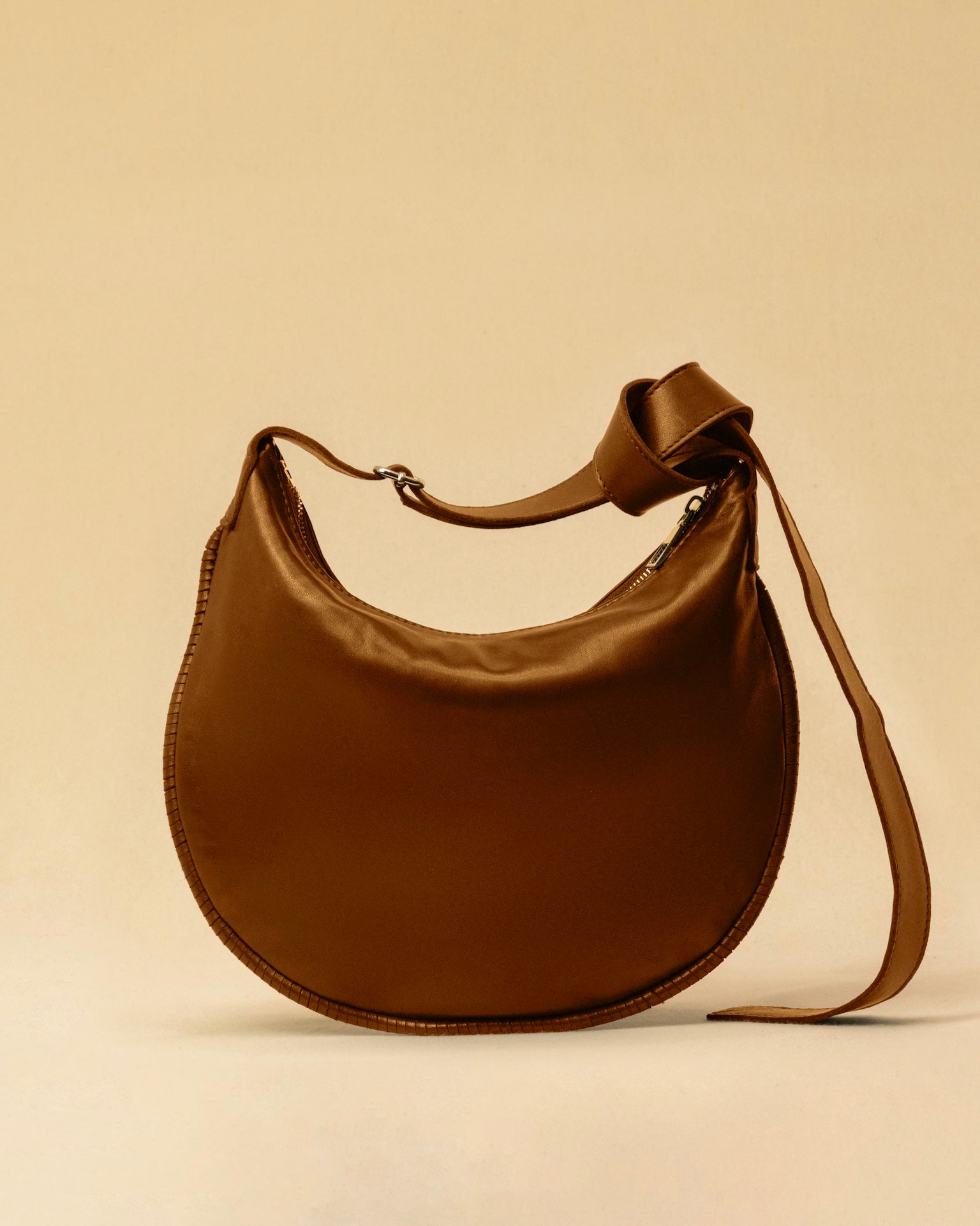 LABEL17's Shoulder Bag Saddle IVY Medium in Cognac, made of finest Lamb-Nappa, hand-crafted in Morocco