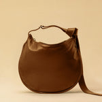 LABEL17's Shoulder Bag Saddle IVY Medium in Cognac, made of finest Lamb-Nappa, hand-crafted in Morocco