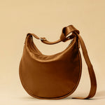 LABEL17's Shoulder Bag Saddle IVY Medium in Cognac, made of finest Lamb-Nappa, hand-crafted in Morocco