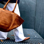 The Shoulder Bag ORIGINAL by LABEL17 is a timeless piece, crafted from fine, vegetable-tanned nappa leather and hand-braided. It features a zipper closure and a convenient interior pocket for your essentials.