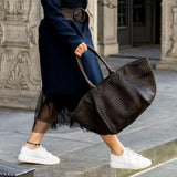 The Shoulder Bag ORIGINAL by LABEL17 is a timeless piece, crafted from fine, vegetable-tanned nappa leather and hand-braided. It features a zipper closure and a convenient interior pocket for your essentials.