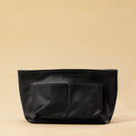The Bag Organizer PENNY by LABEL17 is crafted from supple nappa leather and brings effortless style and order to large handbags. With integrated outer and inner compartments and a magnetic closure, it fits perfectly into our Shoulder Bag ORIGINAL.