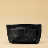 The Bag Organizer PENNY by LABEL17 is crafted from supple nappa leather and brings effortless style and order to large handbags. With integrated outer and inner compartments and a magnetic closure, it fits perfectly into our Shoulder Bag ORIGINAL.