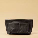 The Bag Organizer PENNY by LABEL17 is crafted from supple nappa leather and brings effortless style and order to large handbags. With integrated outer and inner compartments and a magnetic closure, it fits perfectly into our Shoulder Bag ORIGINAL.